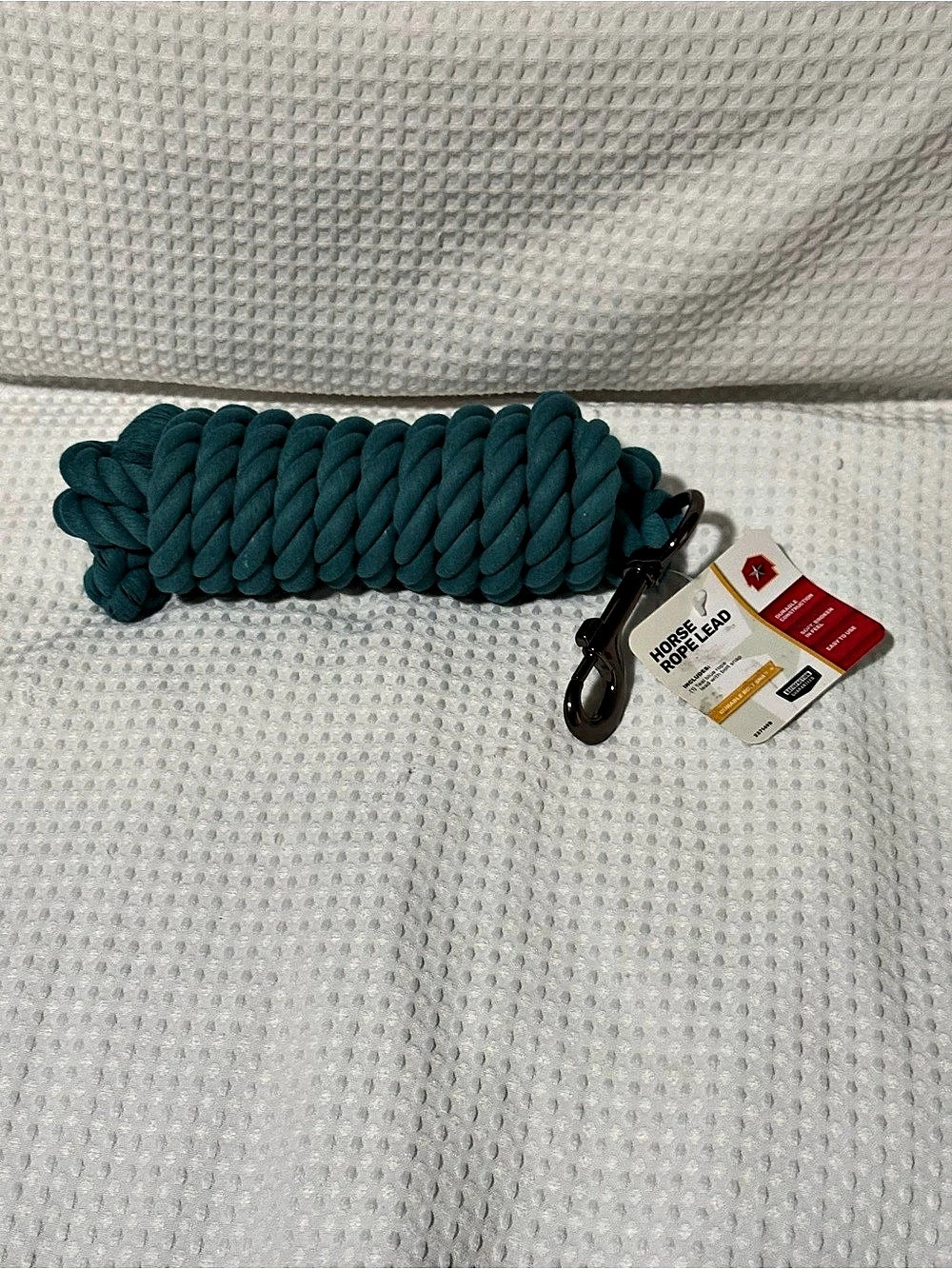 Horse Rope Lead in teal blue with a thick rope and snap hook. New with tags.